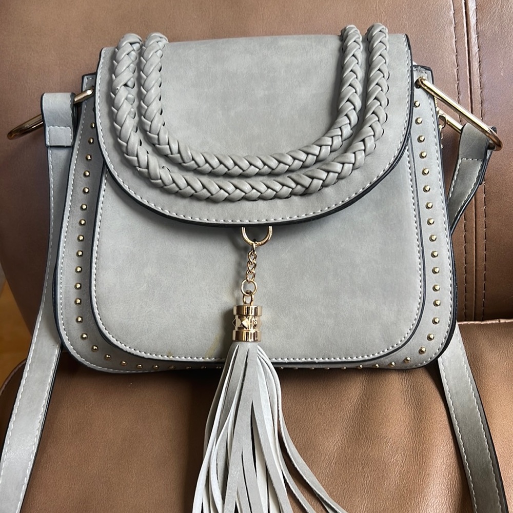 Tom Clovers shoulder bag, very clean like new, 3 smaller pockets, 1 big one
